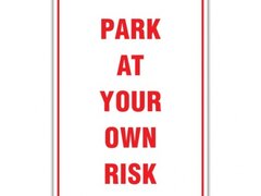 PARK AT YOUR OWN RISK SIGN